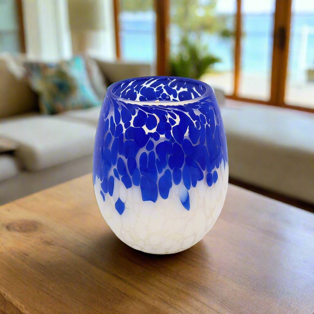 Blue candle jar on a table