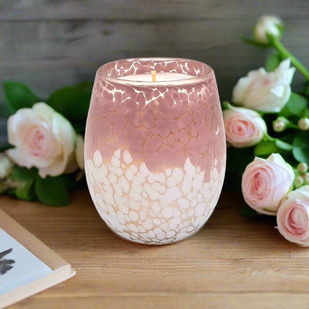Pink candle jar with flowers